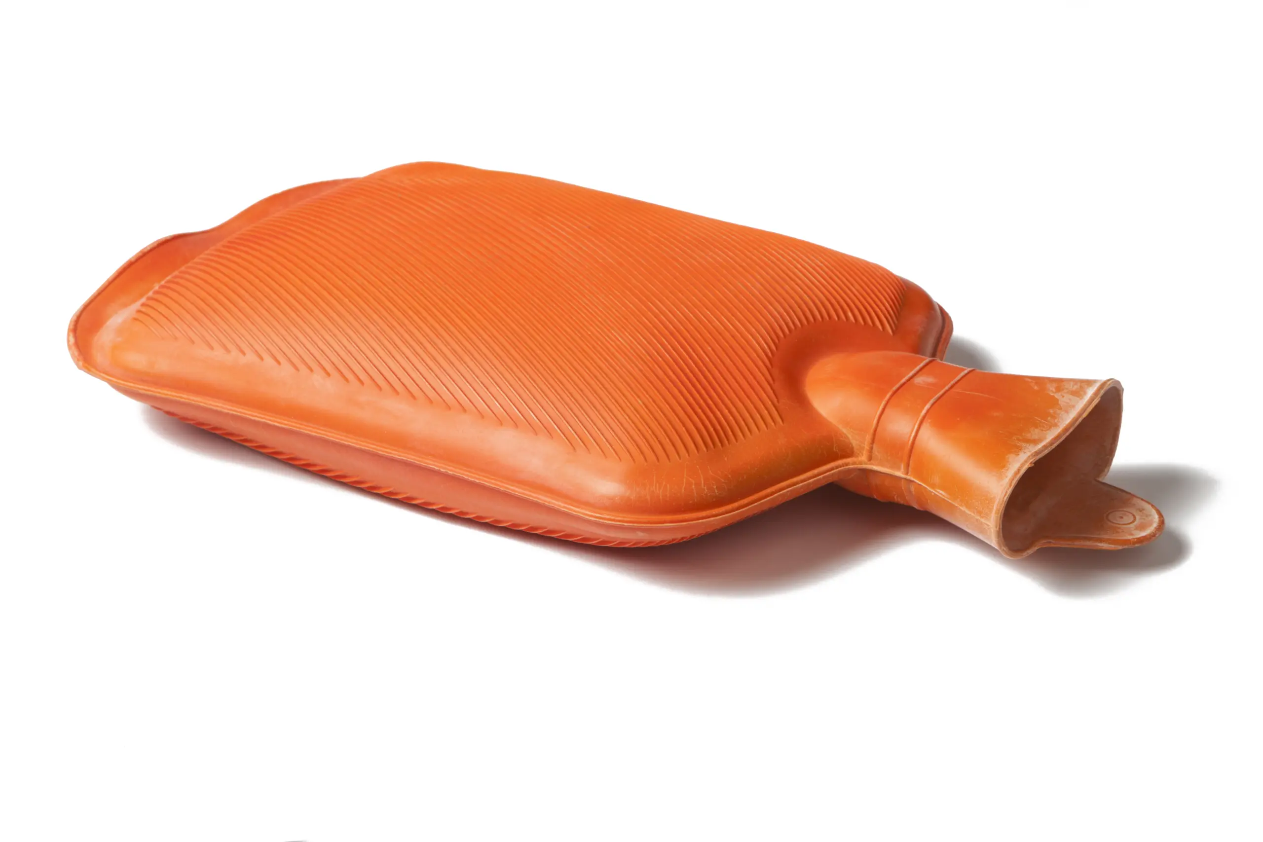 Orange Wärmflasche zur Wärmetherapie, ideal zur Schmerzlinderung und Förderung der Heilung.