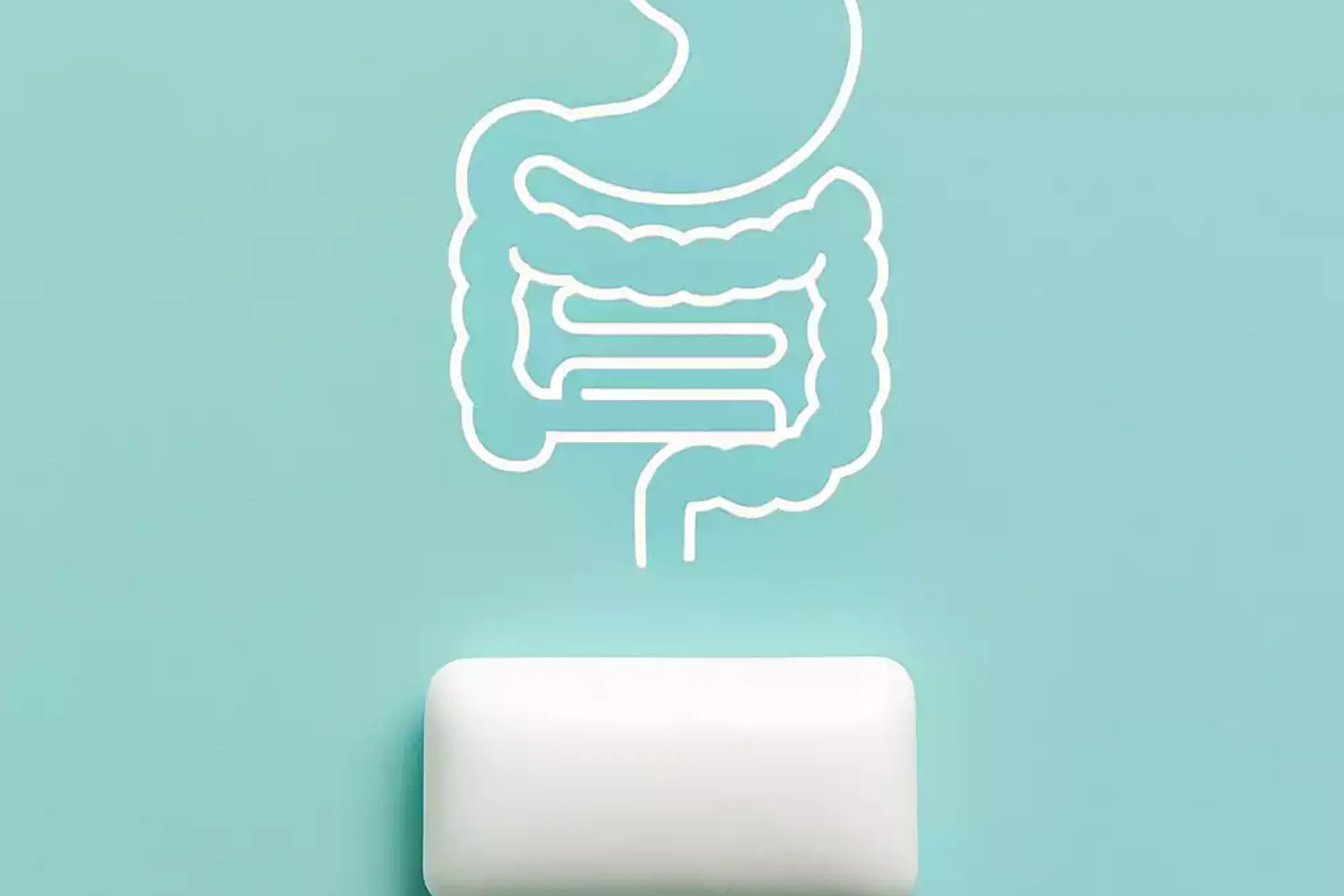 Kaugummi und Magen Darm – Kaustreifen vor einem Magen-Darm-Symbol zur Verdauungsunterstützung