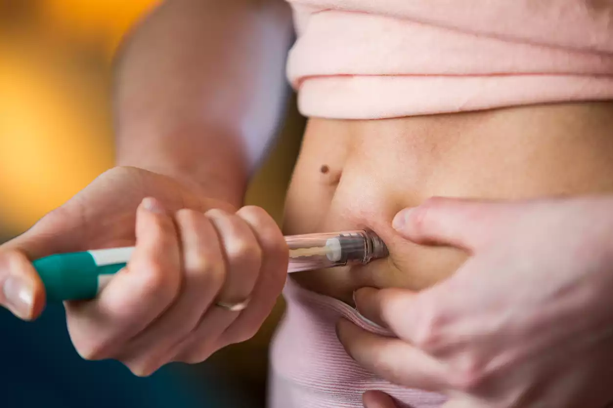 Infografik: Ampelsystem der Nebenwirkungen bei der Mounjaro Therapie